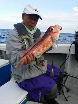 アマダイと釣り人の写真