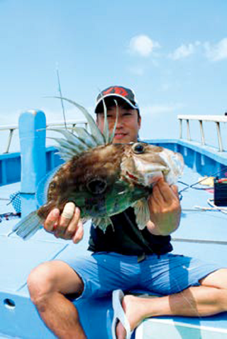 マトウダイと男性