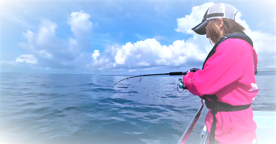 ロッドと釣り人のアップ写真