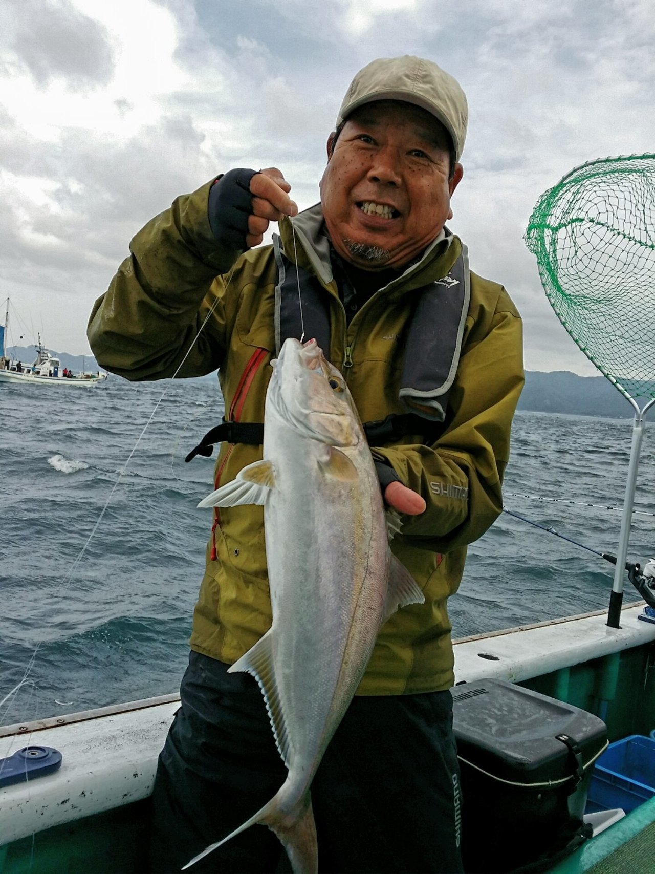 魚と釣り人の写真