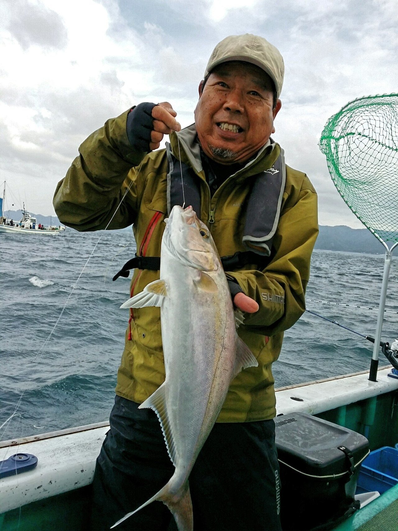 魚と釣り人の写真