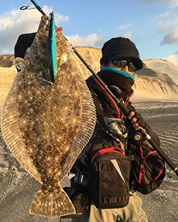 魚と釣り人のアップ写真