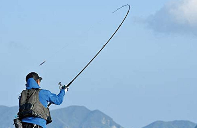ロッドと釣り人のアップ写真