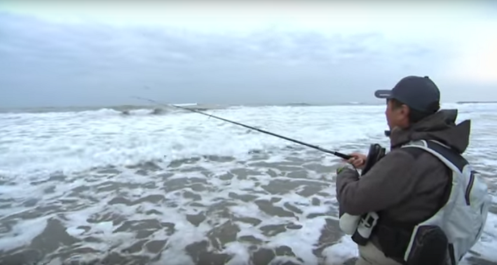 砂浜 釣り人 写真