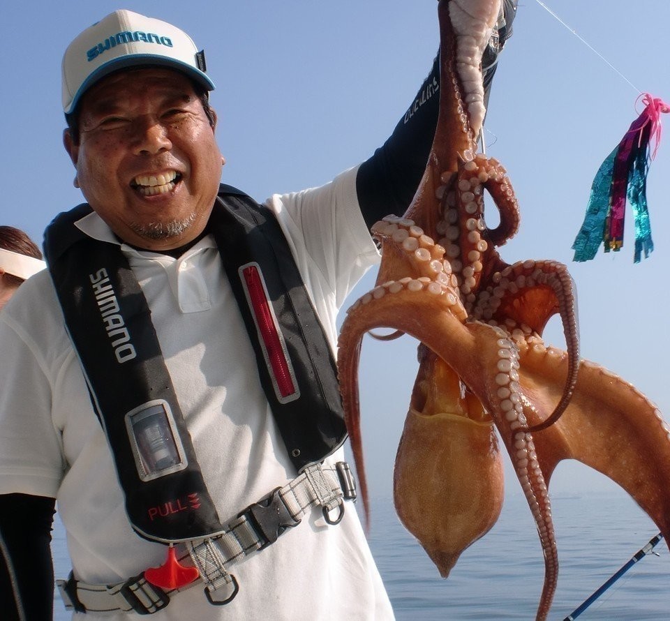 タコ　釣り人　写真