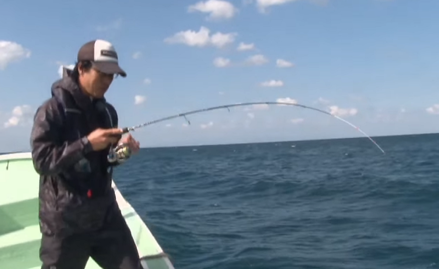 釣り人 ロッド 写真