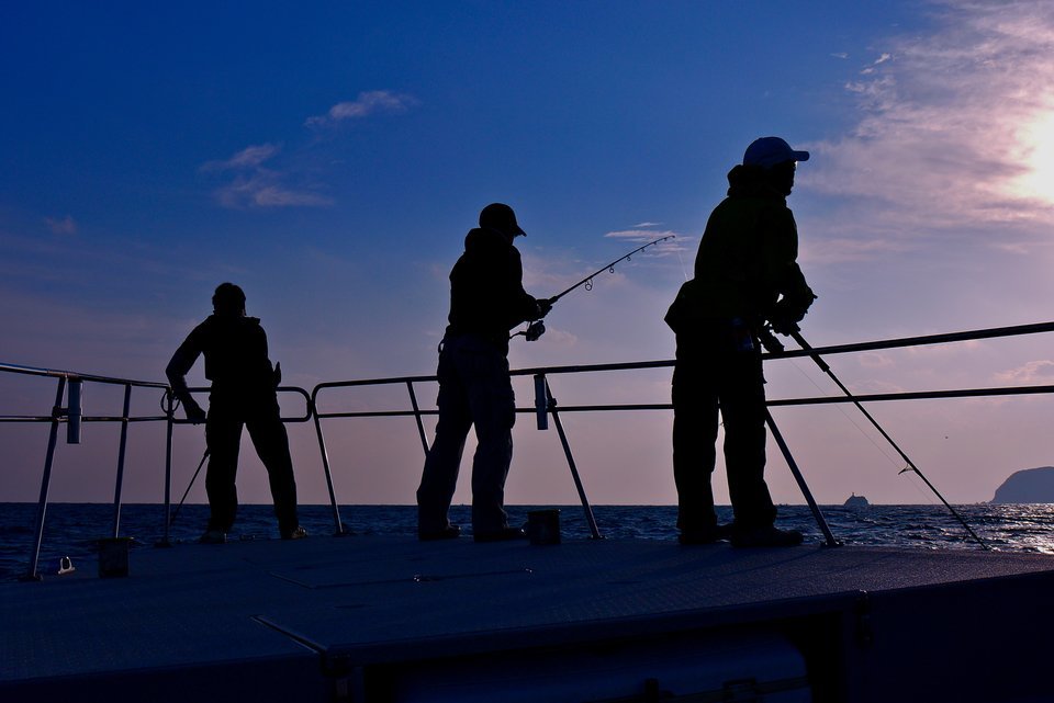 釣り人　夕暮れ　画像