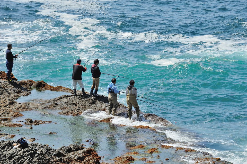 釣り人　海　写真
