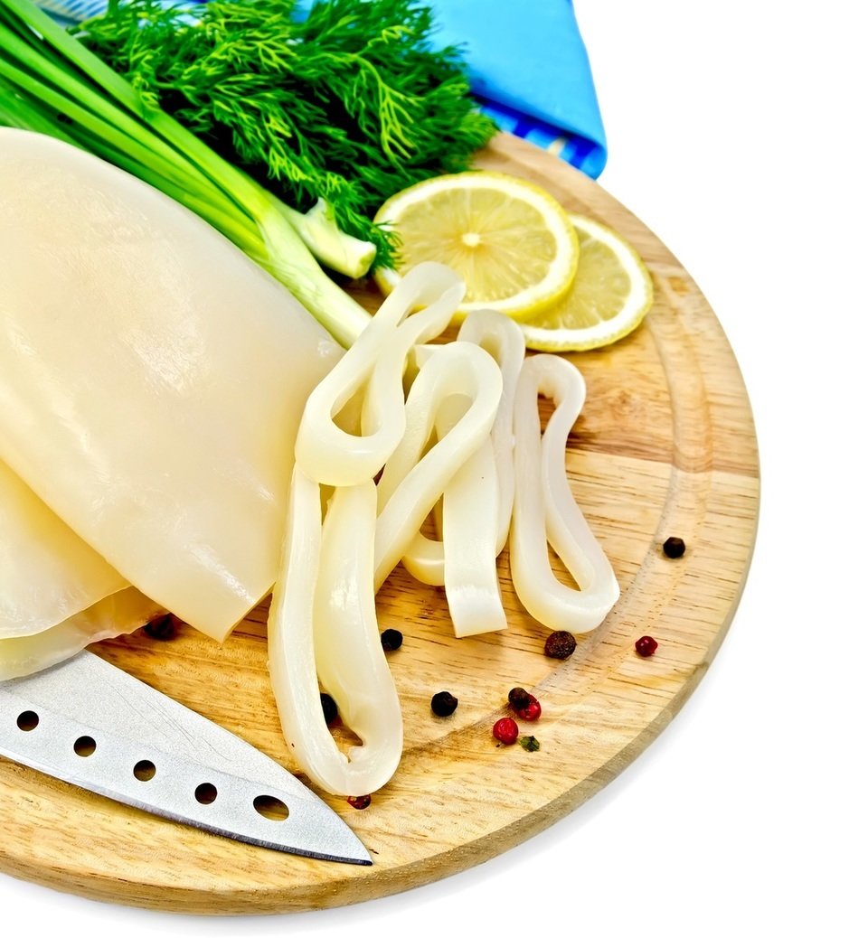 イカ　イカ輪切り　包丁　レモン　写真