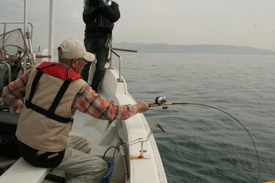 釣り人　船　海　写真