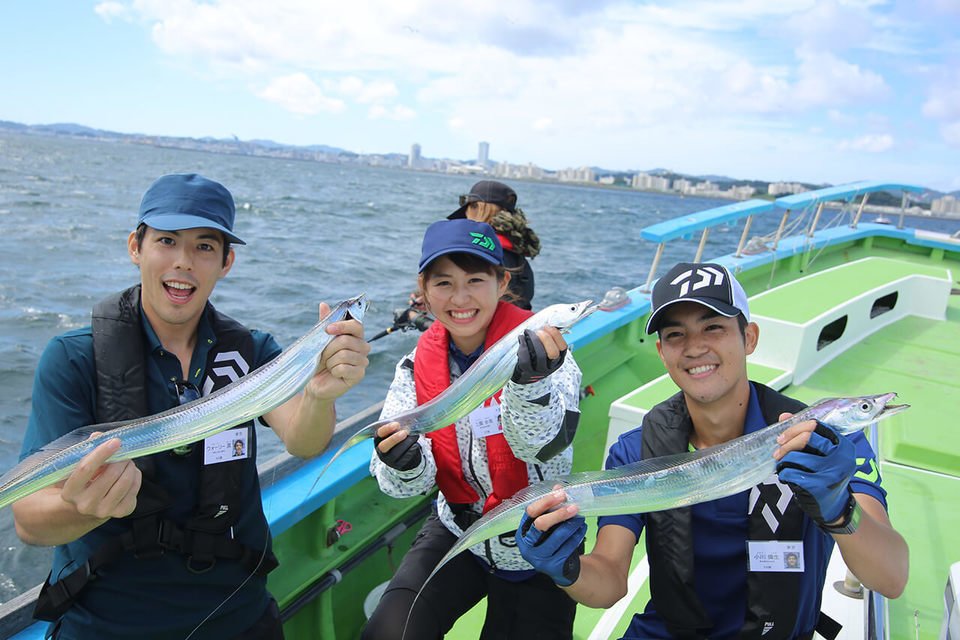 人　船　魚　写真