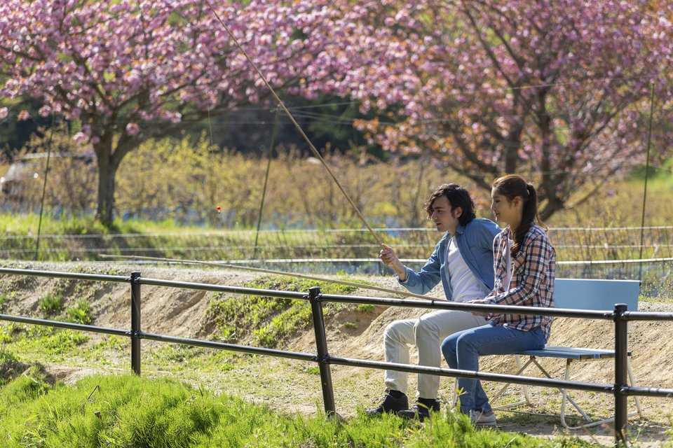 男性　女性　釣り人　釣り竿　写真