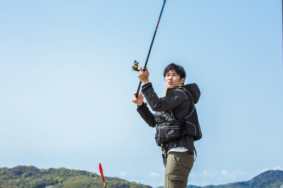 釣り人　男性　釣り竿　写真