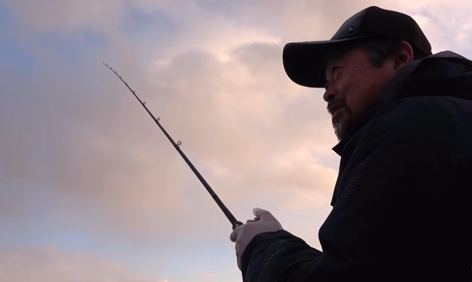 釣り人　ロッド　写真