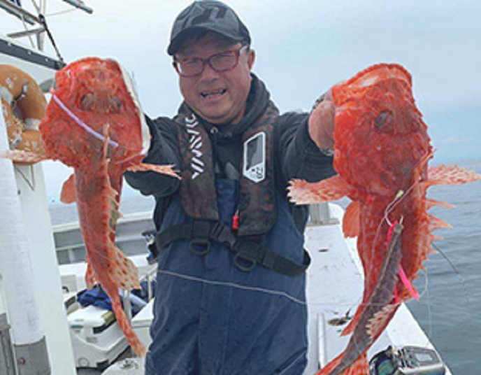 魚　釣り人　写真