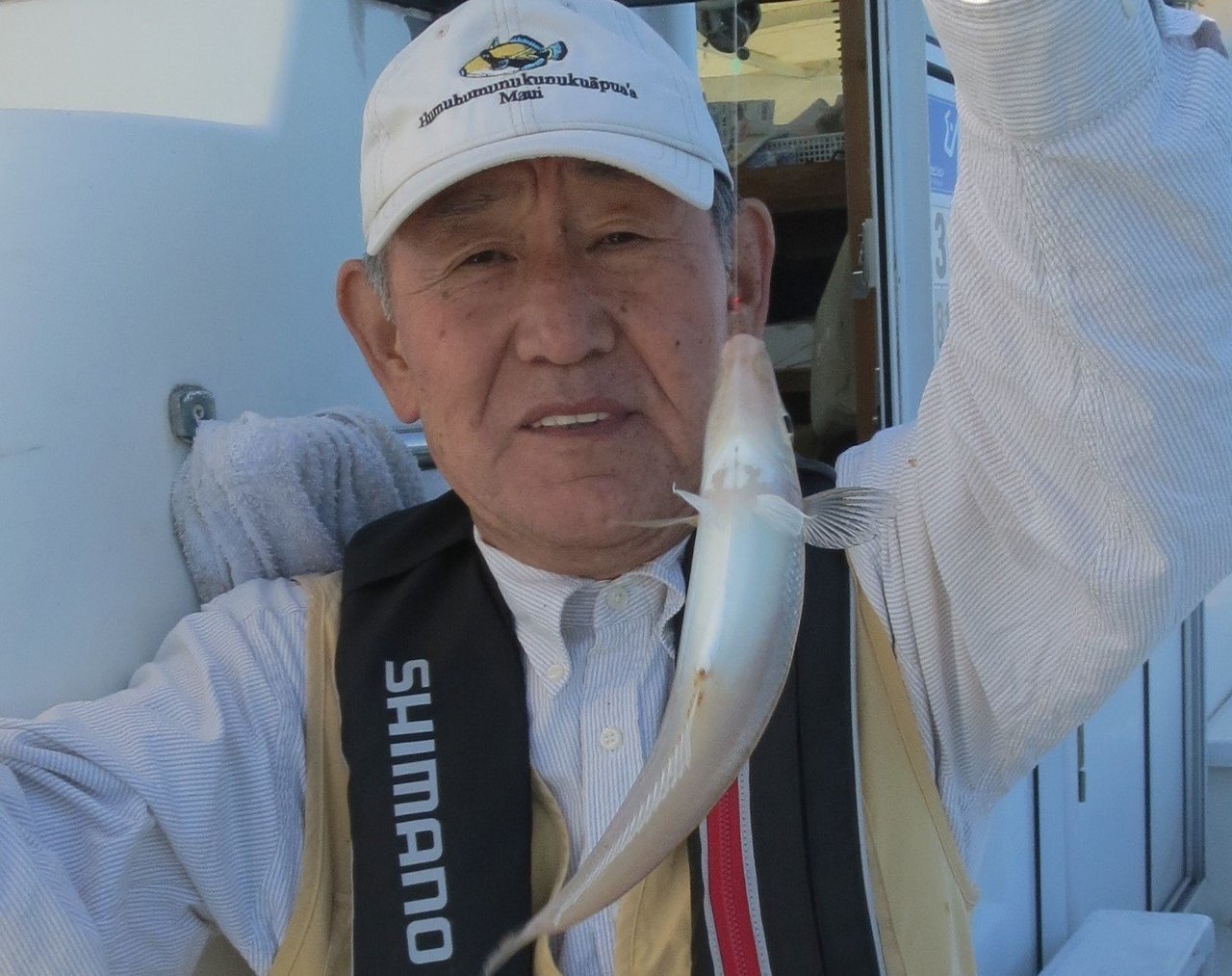 釣り人とキスの写真