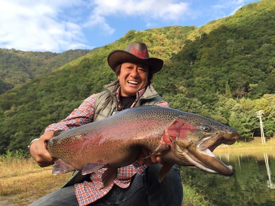 村田基氏と魚の写真