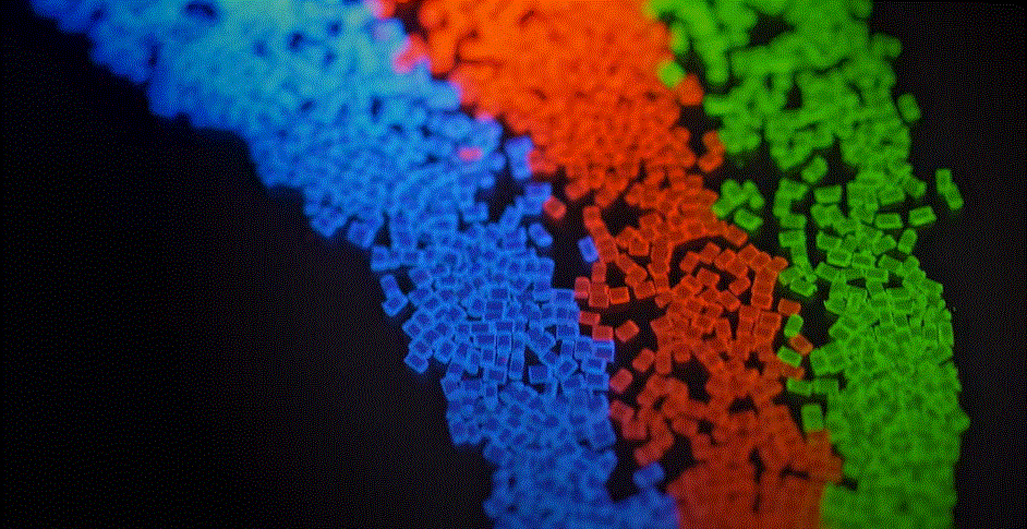 3色の光の粒の写真